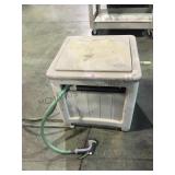 Plastic outdoor hose reel container with hose