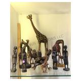 Hand carved ironwood tribal figures & giraffes