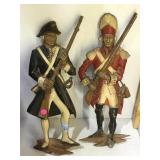 a pair of Colonial soldier metal wall hangings