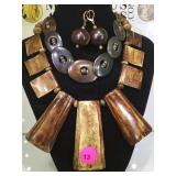 2 wooden necklaces & a pair of wooden earrings