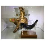 Carved wooden man riding water buffalo & carved