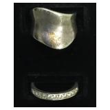 A pair of sterling rings, 1- clear gems, size 5.5