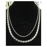 A pair of sterling silver chain necklaces