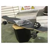 Electric skateboard  w/charger (as is). Local