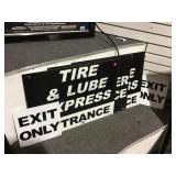 3 metal tire & lube signs & 2 metal exit only
