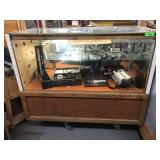 Lighted   Display cabinet on wheels  contents n