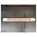 Johnson and Johnson first aid center vintage sign