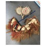 Islander Vintage grass skirt and Paddles