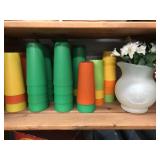 Vintage plastic cups and Kool-Aid jug