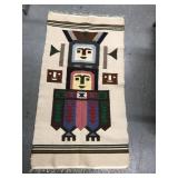 Indian rug with totem pole