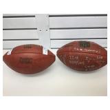 Pair of autographed Wilson footballs