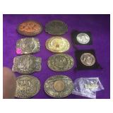 8 belt buckles, plus 2 Smithsonian member tokens,