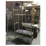 Metal tiered metal shelf.       
Local pickup