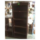 Dark brown book shelf.       
Local pickup only