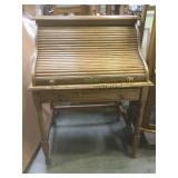 Bradford oak small roll top desk.       
Local