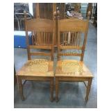 2 matching wood & rattan chairs.       
Local