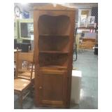 Wood corner shelf w/ bottom storage.
