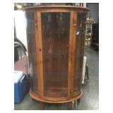 Blonde wood & convex glass display hutch.