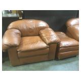 Overstuffed brown leather chair w/ ottoman.