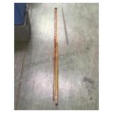 Pool sticks converted to walking sticks.