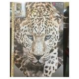 Rhinestone leopard print on canvas.     
Local