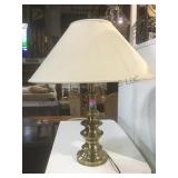 Brass table lamp w/ shade.       
Local pickup