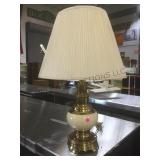 Brass table lamp w/ shade.         
Local pickup