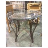 Round metal & glass side table.      
Local