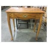 Occasional table w/ drawer.         
Local