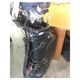 Leather Burton golf bag with Titleist clubs local