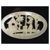 Vintage carved mother of pearl brooch