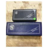 2 empty Smith and Wesson boxes
