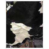 Black & white tanned cowhide rug, local pickup