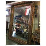 approx 64/90 ornately framed beveled mirror,