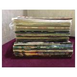 Lot of marvel comics and game informer magazines.