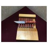 Lot of 8 Tramontina knife set w/ hanging rack.