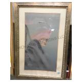 Printed portrait with intricate frame. Frame is