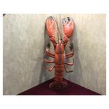 Decorative plastic lobster. Few screw holes from