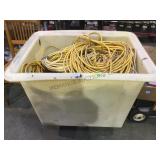 Large rolling tub filled with assorted extension
