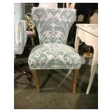 Abstract patterned chair with hobnail accents