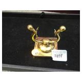 Pocket watch holder, brass, mkd on base