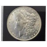 1887 Morgan silver dollar, encased