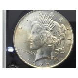 1922  Silver Peace Dollar, encased