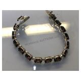 Sterling bracelet w/ purple gemstones