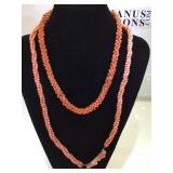 A pair of coral necklaces