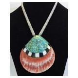 Native American inlaid turquoise shell pendant on