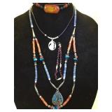 Neck w/ Southwest style necklaces & bracelets