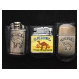 Collection of 3 Camel smokes lighters w/ pouches.