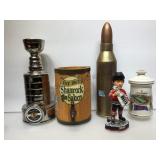 Bullet decanter, Toews hockey bobble head, Black