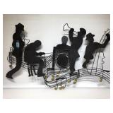 Cut metal Jazz wall hanging 36 x 21.      
Local